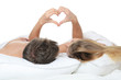 Beautiful pair lays in a bed