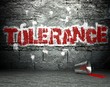 Graffiti wall with tolerance, street background