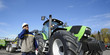 modern farmer with tractor and plough, latest models