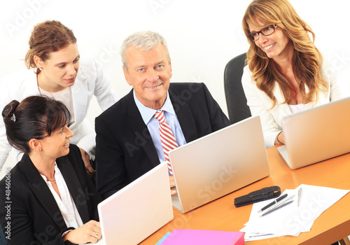 Photo: Business people discussing in a meeting Business people discussing in a meeting