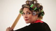 Comic scene : Housewife as a baseball player make a strong hit