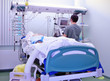 Medical personnel near heavy patient