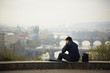 Sad man in autumn park, Prague