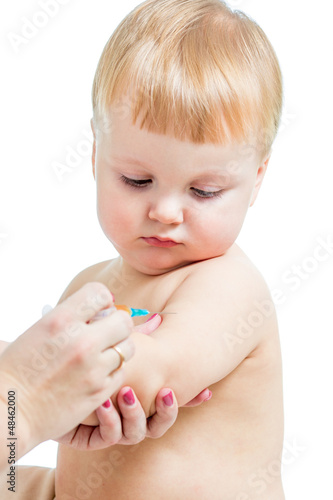 Photo: doctor vaccinating baby boy isolated on a white background doctor vaccinating baby boy isolated on a white background