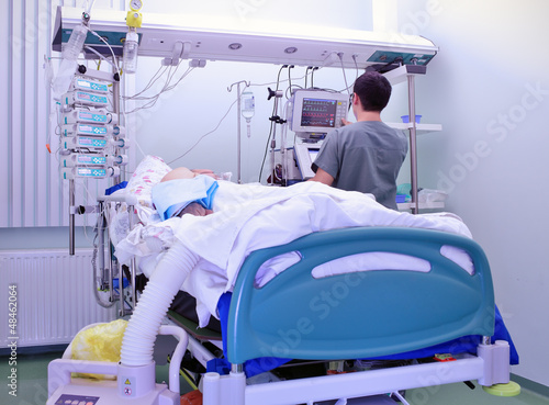Photo: Medical personnel near heavy patient Medical personnel near heavy patient