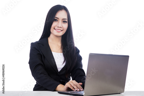 Photo: Businesswoman smiling at camera Businesswoman smiling at camera