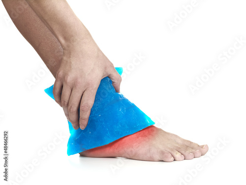 Photo: Cool gel pack on a swollen hurting ankle. Cool gel pack on a swollen hurting ankle.