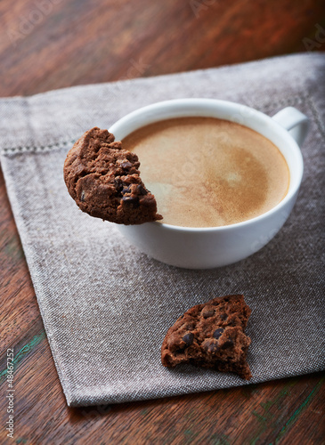 Photo: Cup of cafe crema with chocolate cookie Cup of cafe crema with chocolate cookie