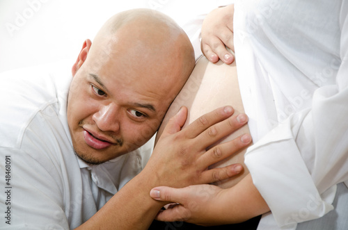 Photo: Cute hispanic american pregnant couple Cute hispanic american pregnant couple