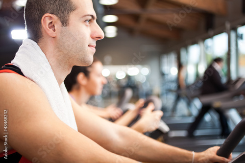 Photo: Man training in a fitness club Man training in a fitness club