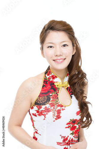 Photo: Beautiful asian woman wearing cheongsam Beautiful asian woman wearing cheongsam