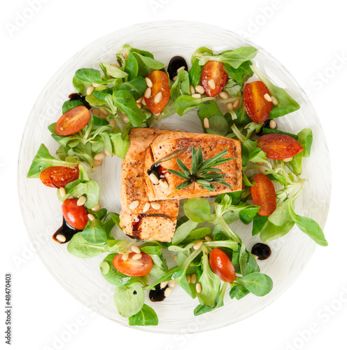 Photo: Rare fried salmon steaks isolated on white Rare fried salmon steaks isolated on white