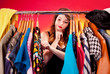 Nothing to wear concept, young woman deciding what to put on