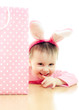 The little girl with pink ears bunny and bag.