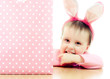 The little girl with pink ears bunny and bag.