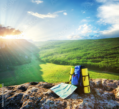 Photo: Backpack and map Backpack and map