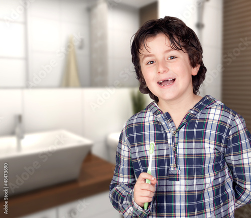 Photo: Smiling child without a toothbrush Smiling child without a toothbrush