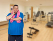 Foto: Pensive fat man playing sport Pensive fat man playing sport