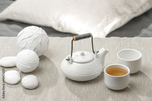Photo: Tea set at beautiful lounge with nobody Tea set at beautiful lounge with nobody
