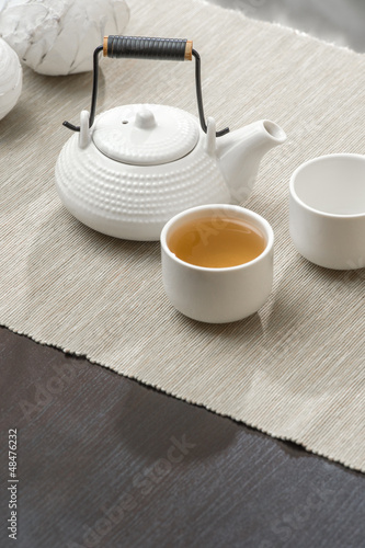 Photo: Tea set at beautiful lounge with nobody Tea set at beautiful lounge with nobody
