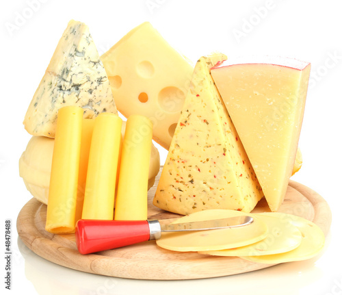 Photo: Various types of cheese isolated on white Various types of cheese isolated on white