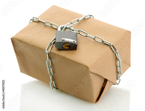 Photo: parcel with chain and padlock, isolated on white parcel with chain and padlock, isolated on white