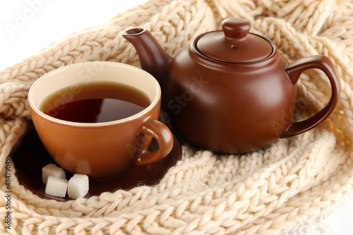 Photo: cup of tea with scarf close-up cup of tea with scarf close-up