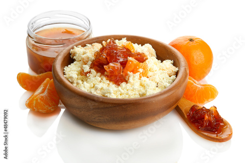 Photo: cottage cheese in bowl with homemade tangerine jam, isolated cottage cheese in bowl with homemade tangerine jam, isolated