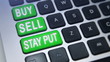 Buy, Sell and Stay Put keys on a laptop computer.