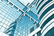 view of glass high rise building skyscrapers