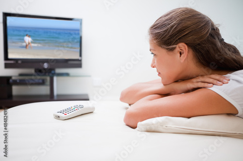 Photo: Woman watching a movie Woman watching a movie