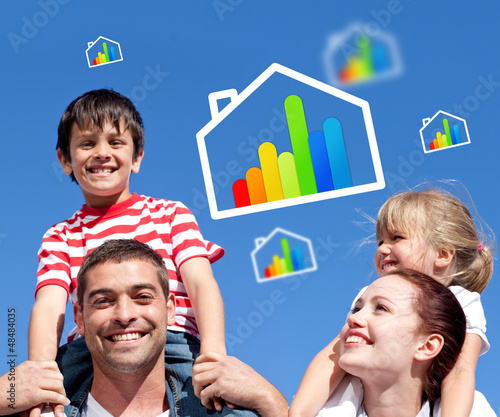 Photo: Parents giving their children piggyback ride Parents giving their children piggyback ride