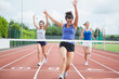 Photo: Athlete celebrates race win at finish line Athlete celebrates race win at finish line