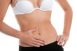 Woman with hand on her stomach