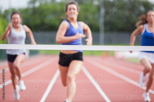 Photo: Athletes close to finish line Athletes close to finish line