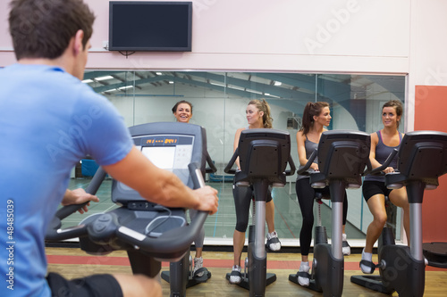 Photo: Happy women at spinning class Happy women at spinning class