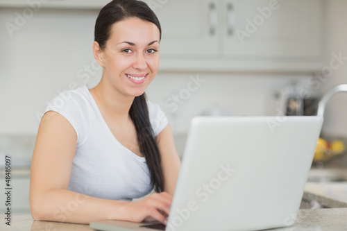 Photo: Woman using the laptop Woman using the laptop