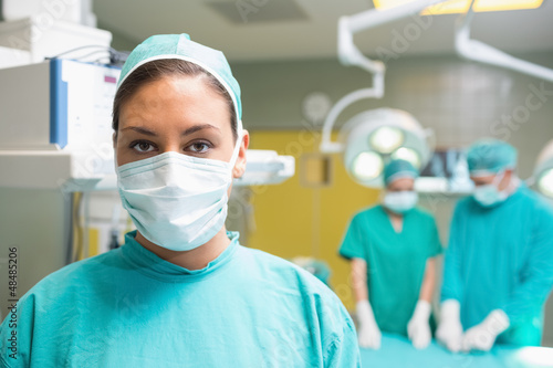 Photo: Female surgeon posing with her uniform Female surgeon posing with her uniform