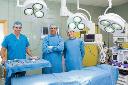Photo: Several Surgeons surrounding an operation table Several Surgeons surrounding an operation table