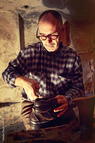 Photo: cobbler at work cobbler at work