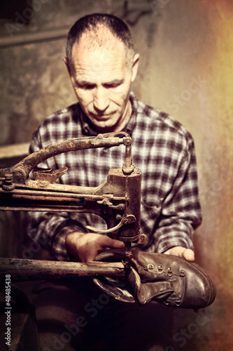 Photo: cobbler at work cobbler at work