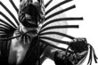 woman in catwoman leather latex fetish wear  silhouette