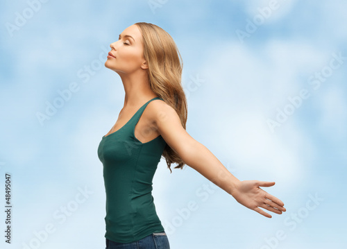 Photo: woman spreading hands woman spreading hands