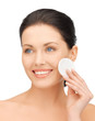 beautiful woman with cotton pad