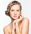Portrait of young woman with braid hairdo
