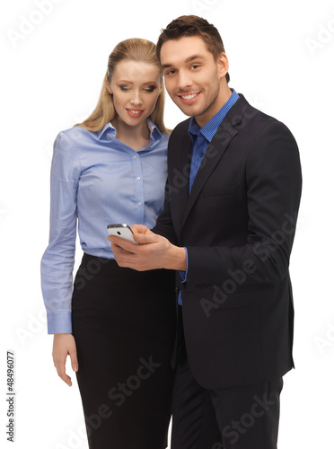 Photo: man and woman reading sms man and woman reading sms