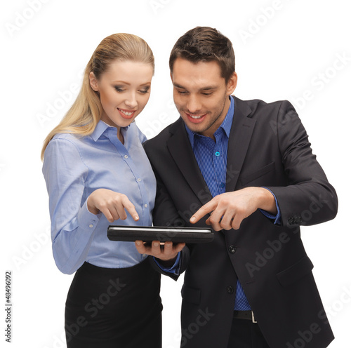 Photo: man and woman with tablet pc man and woman with tablet pc