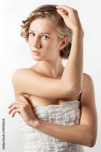 Photo: Portrait of young woman with braid hairdo Portrait of young woman with braid hairdo