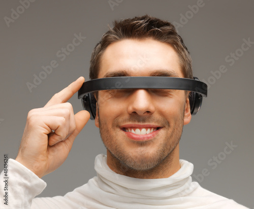 Photo: man with futuristic glasses man with futuristic glasses