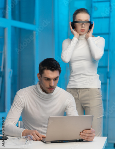 Photo: man and woman in laboratory man and woman in laboratory